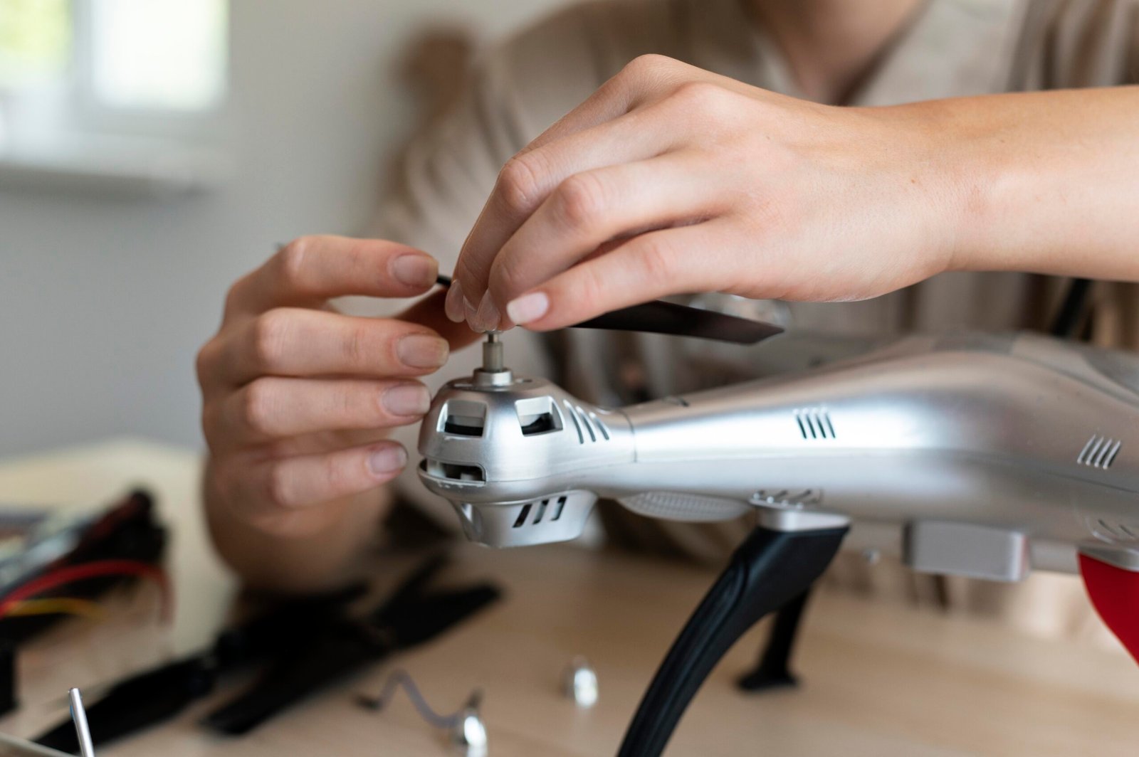 Technician repairing drone at DJI Service Center Mumbai workshop